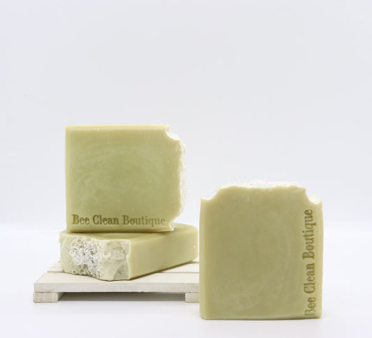 3 bars of handmade key lime coconut soap are displayed on a white surface