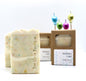 Two Birthday cake bar soaps displayed in front of 2 boxed bars of birthday cake soap